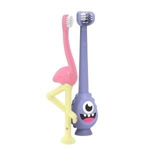 image:imageDr Browns ToothScrubber Toddler Toothbrush TripleSided Training Toothbrush with Suction Cup Base Green Monster Baby Oral Care Ages 14 Years2 Pack  Toddler Toothbrush  Purple Monster  Flamingo