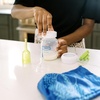 image:imageDr Browns 100 Silicone OnePiece Breast Pump HandsFree Breast Milk Collector with AntiColic Options Baby Bottle 4 oz with Slow Flow Nipple Travel Lid and Travel BagClear  Breast Pump  Bottle