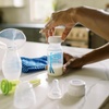 image:imageDr Browns 100 Silicone OnePiece Breast Pump HandsFree Breast Milk Collector with AntiColic Options Baby Bottle 4 oz with Slow Flow Nipple Travel Lid and Travel BagClear  Breast Pump  Bottle