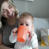 image:imageDr Browns Milestones Cheers 360 Spoutless Transition Cup with Handles Travel Friendly and Leak Free Sippy for Babies and Toddlers Pink BPAFree 7 oz200 mL 6mCoral